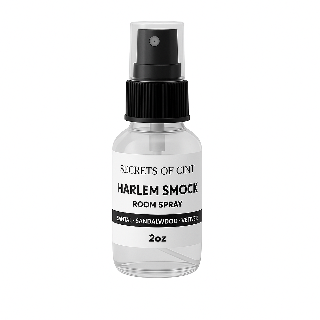 2 oz Harlem Smock room spray with notes of sandalwood, vetiver, santal in a clear bottle.