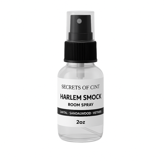 2 oz Harlem Smock room spray with notes of sandalwood, vetiver, santal in a clear bottle.